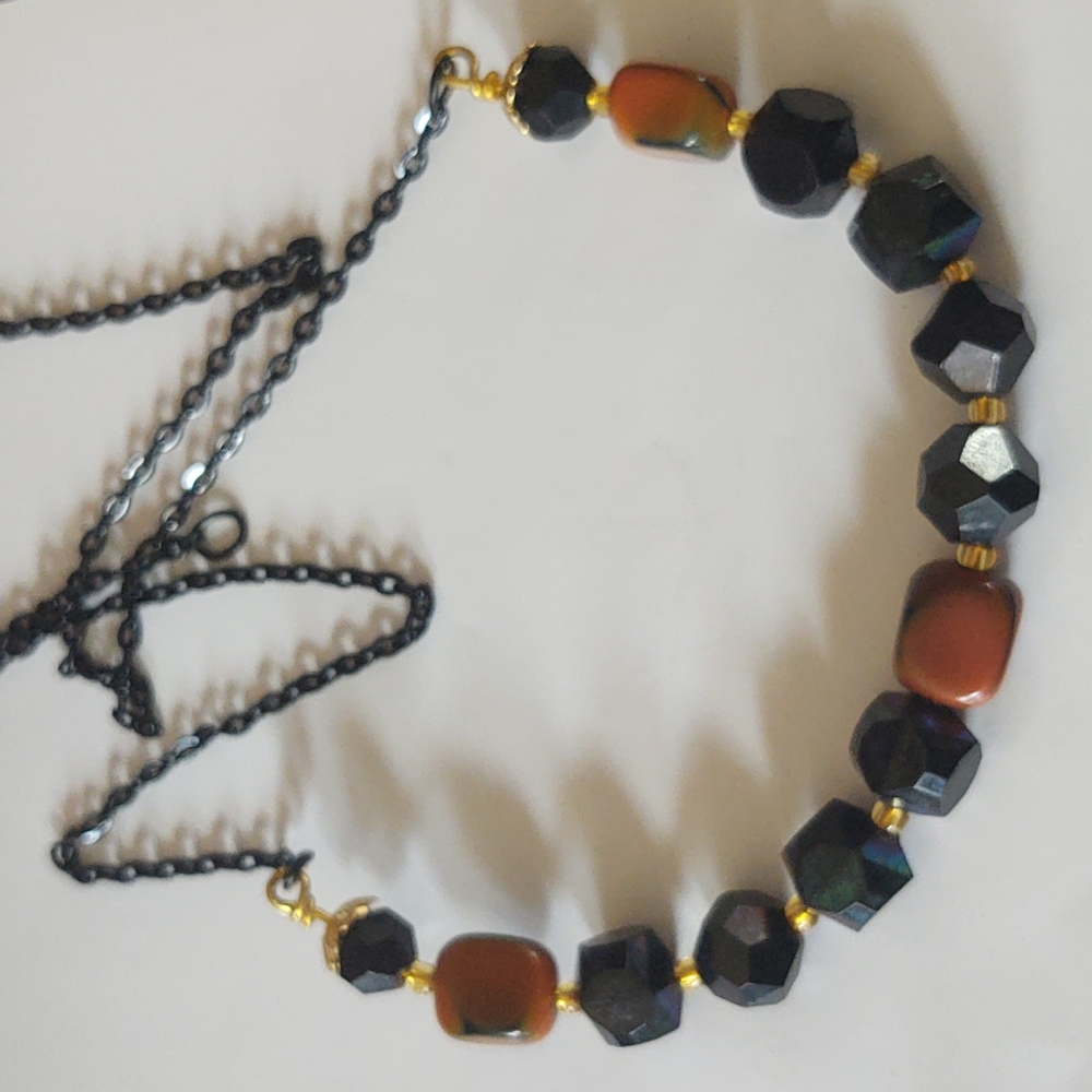 20 inch black chain goes down to 18